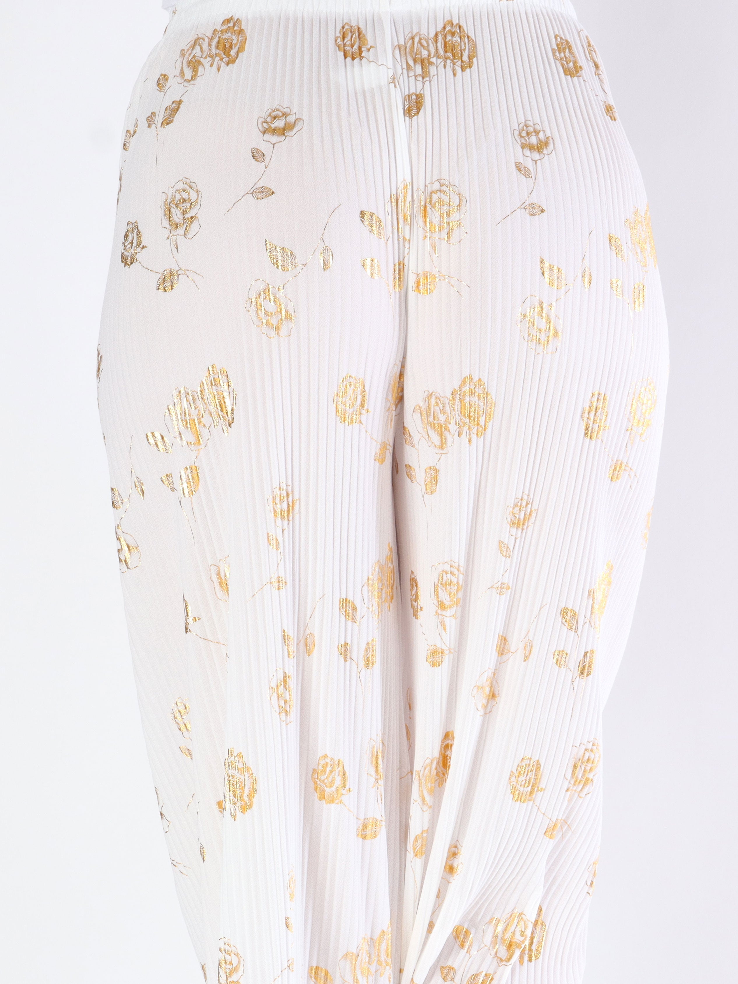 Alpha - Plisserade byxor med guldblommor